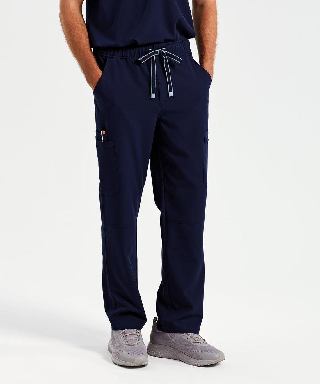 Unisex Stretch Scrub Cargo Trousers worn by a model